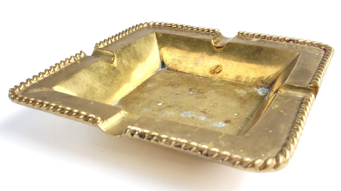 Vintage Brass Cigarette Cigar Ashtray with Decorative Edging: Vintage piece Width: 2 Height: 8 Low Estimate: 15 High Estimate: 50
