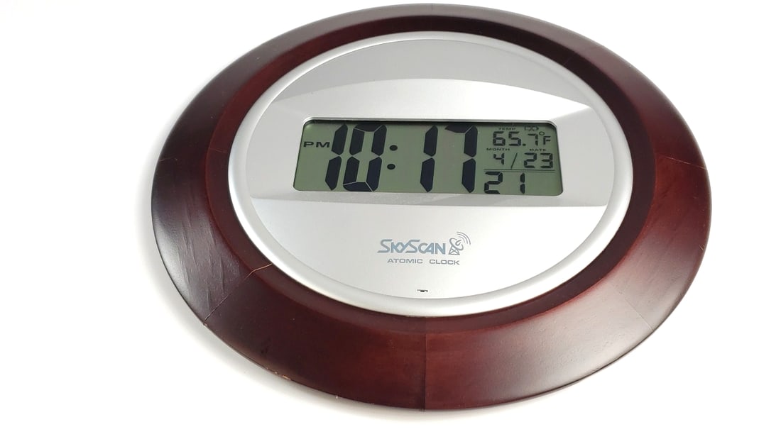 SkyScan 10" Atomic Clock with Temperature Display, Round Wood Frame: Nice Width: 2 Height: 10 High Estimate: 40 Low Estimate: 20