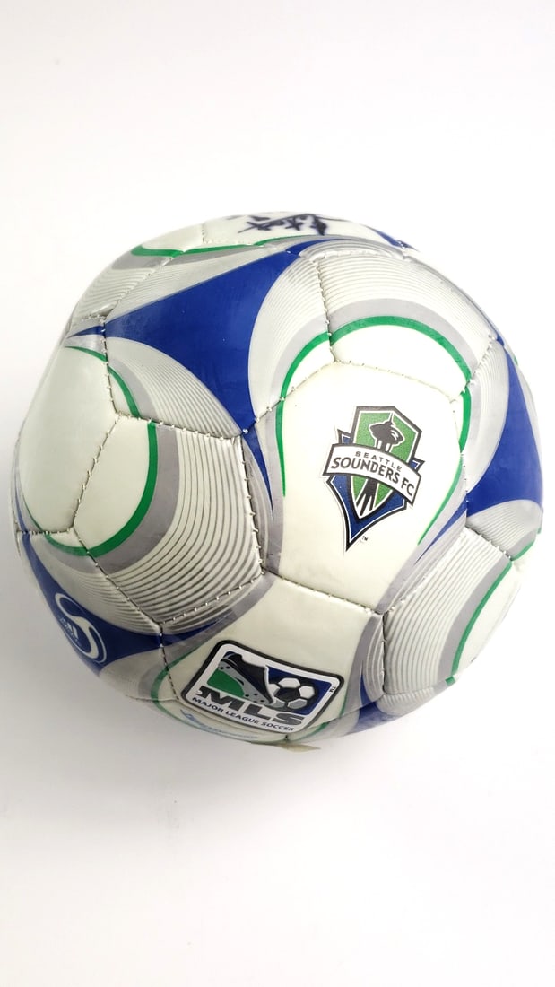 Signed Seattle Sounders Mini Ball: Great, low on air Height: 5 High Estimate: 75 Width: 5 Low Estimate: 20