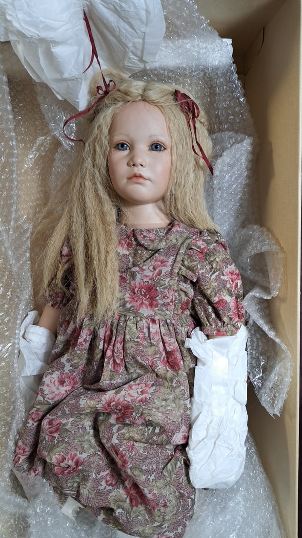 Annette Himstedt Eva Limited Edition Porcelain Doll With Box And C O A: Please read descriptions and examine pictures carefully. Take into account shipping when bidding. 15x30x10 15lbs Height: 30 Width: 10 Low Estimate: 80.00 High Estimate: 650.00