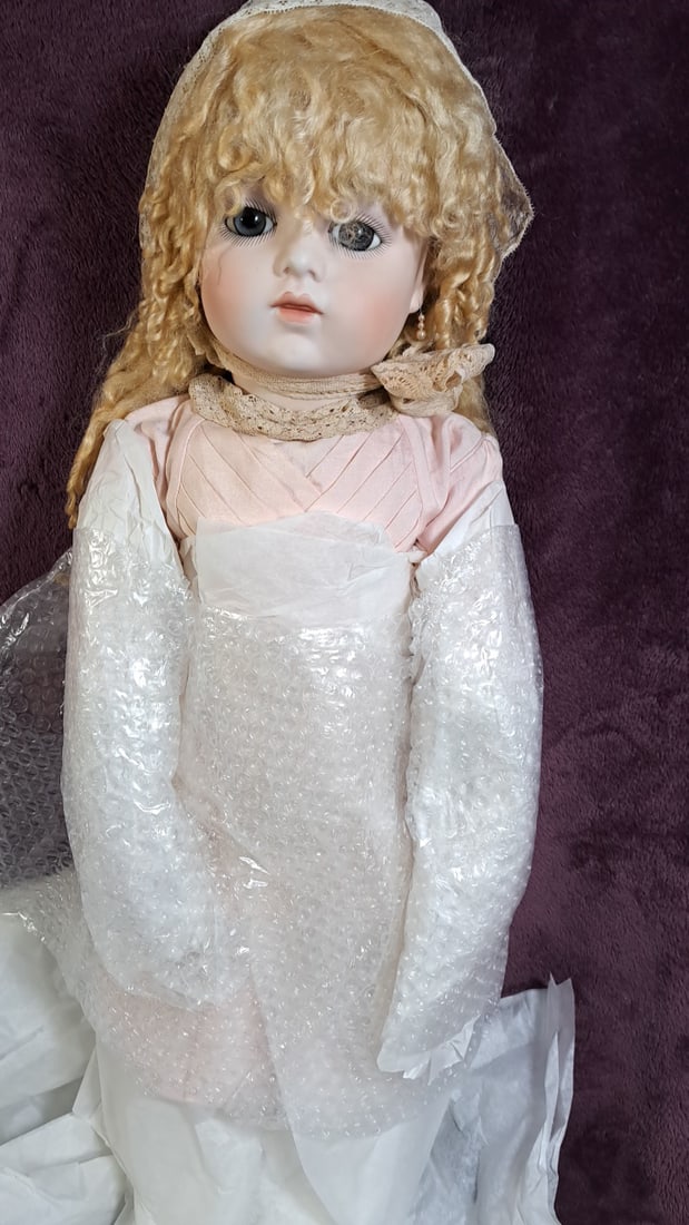 Colleen Phillips Artist Made Porcelain Doll Bru J 13 2002: Please read descriptions and examine pictures carefully. Take into account shipping when bidding. 46x17x10 15lbs Height: 17 Width: 10 Low Estimate: 150.00 High Estimate: 300.00