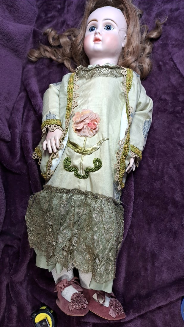 Colleen Phillips Porcelain Doll With Lace Dress And Velvet Shoes: Please read descriptions and examine pictures carefully. Take into account shipping when bidding. Head needs reattached and wig secured 34x10x10 5lbs Height: 10 Width: 10 Low Estimate: 15.00 High Esti