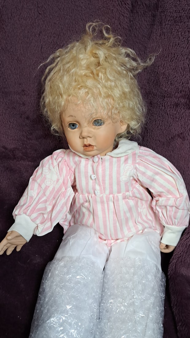 Gaby Rademan A96 Artist Made Porcelain Doll With Teddy Bear: Please read descriptions and examine pictures carefully. Take into account shipping when bidding. 40x6x12 15lbs Height: 6 Width: 12 Low Estimate: 20.00 High Estimate: 150.00