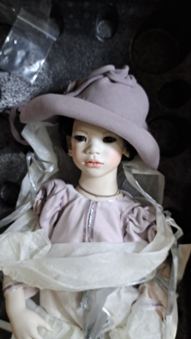 Annette Himstedt Shianji Porcelain Doll 29/70 Coa Artist Made: Please read descriptions and examine pictures carefully. Take into account shipping when bidding. 36x25x15 15lbs Height: 25 Width: 15 Low Estimate: 150.00 High Estimate: 1200.00