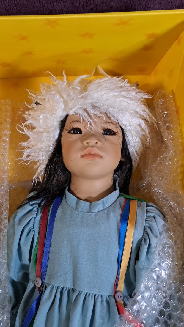 Annette Himstedt Kima Doll With Coa And Box: Please read descriptions and examine pictures carefully. Take into account shipping when bidding. 36x20x12 15lbs Height: 20 Width: 12 Low Estimate: 50.00 High Estimate: 600.00