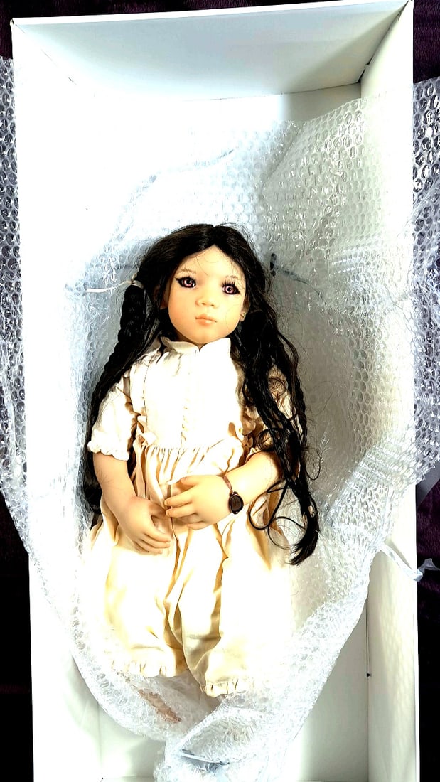 Annette Himstedt An-mei Doll With Box And Coa: Please read descriptions and examine pictures carefully. Take into account shipping when bidding. 36x12x10 15lbs Height: 12 Width: 10 Low Estimate: 50.00 High Estimate: 400.00