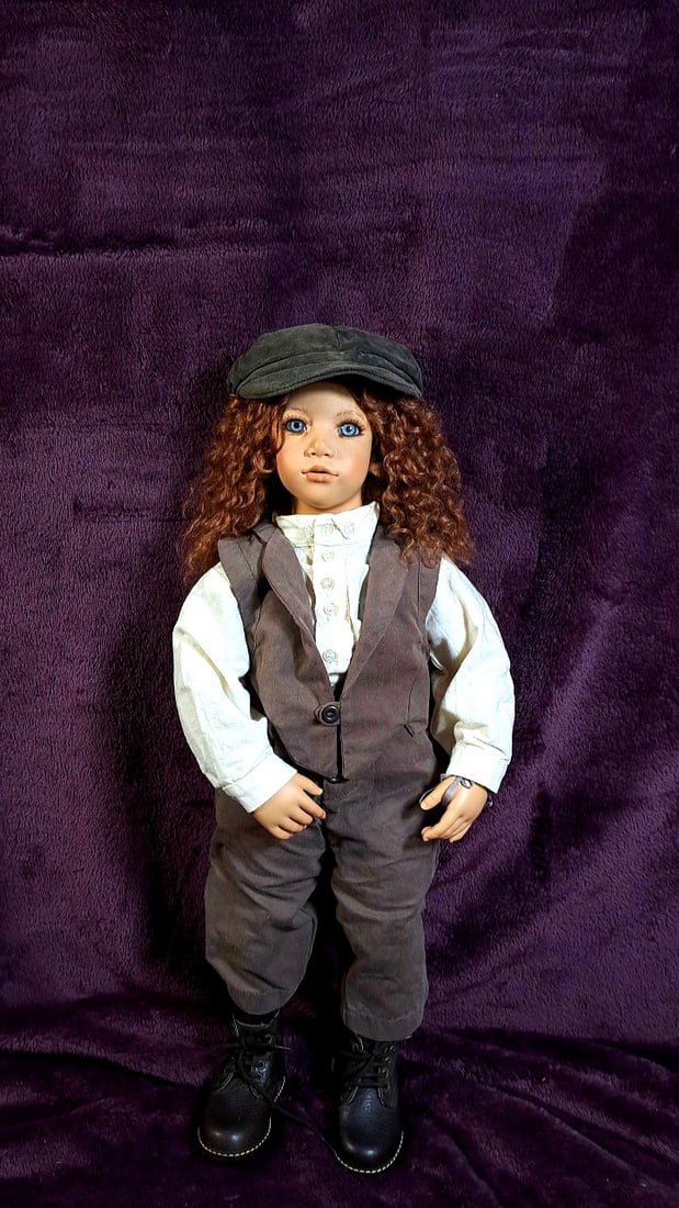 Annette Himstedt Charly Doll With Coa And Box: Please read descriptions and examine pictures carefully. Take into account shipping when bidding. 36x12x10 15lbs Height: 12 Width: 10 Low Estimate: 50.00 High Estimate: 250.00