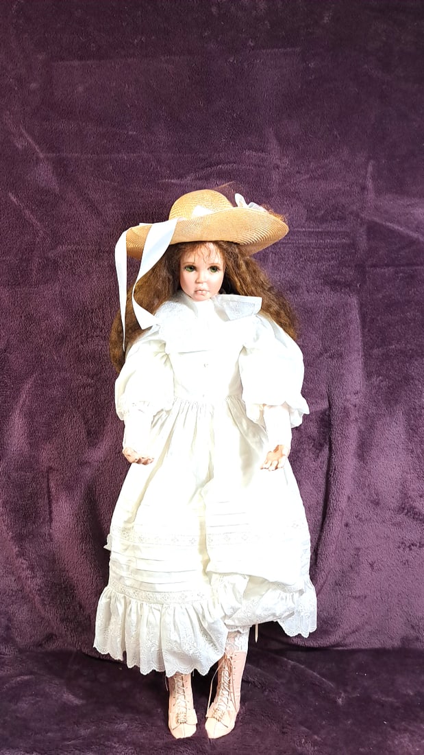 Karen Anderson Blandford Adelaide 4/10 With Hat And Coa: Please read descriptions and examine pictures carefully. Take into account shipping when bidding. 45x15x15 15lbs Height: 15 Width: 15 Low Estimate: 50.00 High Estimate: 150.00