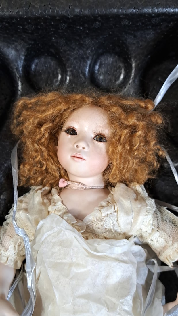 Annette Himstedt Klara Porcelain Doll With Coa And Box And Hat & Flower Basket: Please read descriptions and examine pictures carefully. Take into account shipping when bidding. 30x20x12 15lbs Height: 20 Width: 12 Low Estimate: 50.00 High Estimate: 500.00