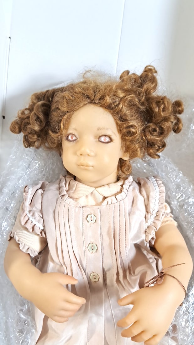 Annette Himstedt Irmi Doll With Coa And Box: Please read descriptions and examine pictures carefully. Take into account shipping when bidding. 36x20x15 15lbs Height: 20 Width: 15 Low Estimate: 50.00 High Estimate: 350.00