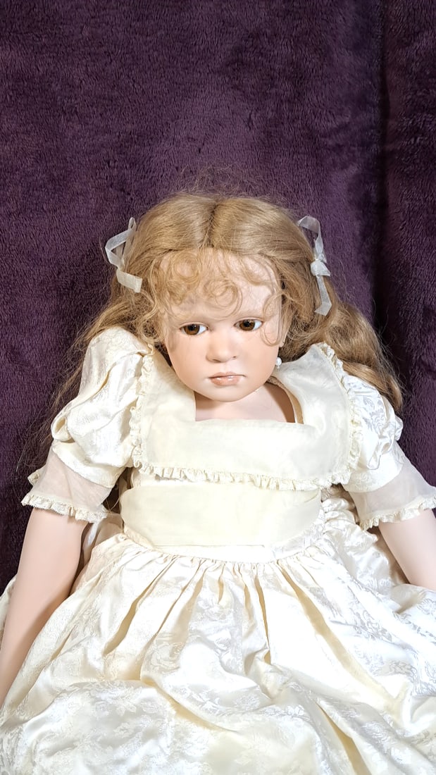 Atlier Ruth Treffeisen Bernadette Artist Made Porcelain Doll With Signed Card And Hat: Please read descriptions and examine pictures carefully. Take into account shipping when bidding. 50x24x20 15lbs Height: 24 Width: 20 Low Estimate: 50.00 High Estimate: 250.00