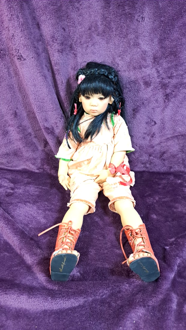 Annette Himstedt Mia Yin Doll With Coa And Box: Please read descriptions and examine pictures carefully. Take into account shipping when bidding. 36x15x20 15lbs Height: 15 Width: 20 Low Estimate: 50.00 High Estimate: 400.00