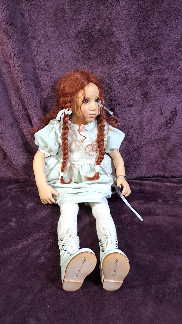 Annette Himstedt Marlie Doll With Coa And Box: Please read descriptions and examine pictures carefully. Take into account shipping when bidding. 36x15x20 15lbs Height: 15 Width: 20 Low Estimate: 50.00 High Estimate: 500.00