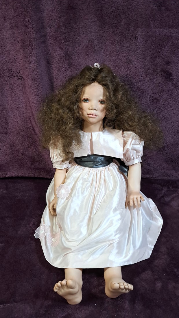 Annette Himstedt Ina Belita Porcelain Doll With Box: Please read descriptions and examine pictures carefully. Take into account shipping when bidding. 40x20x15 15lbs Height: 20 Width: 15 Low Estimate: 50.00 High Estimate: 500.00