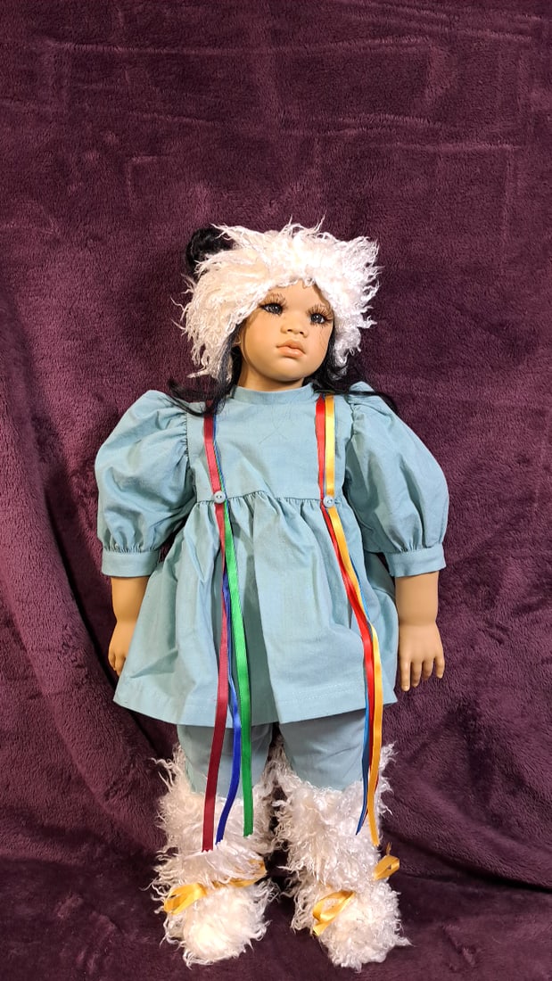 Annette Himstedt Kima Doll With Box: Please read descriptions and examine pictures carefully. Take into account shipping when bidding. 36x20x15 15lbs Height: 20 Width: 15 Low Estimate: 50.00 High Estimate: 500.00