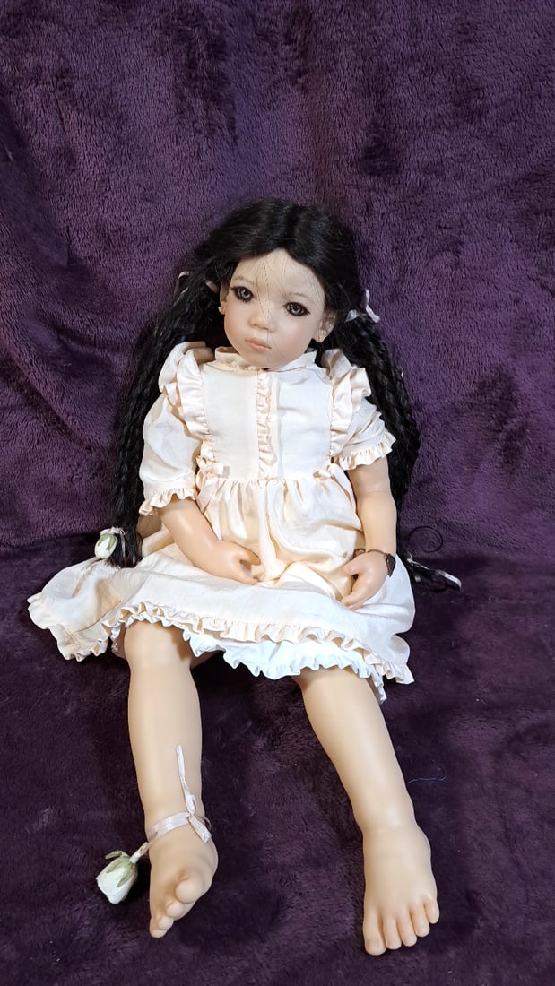 Annette Himstedt An Mei Doll With Coa And Box: Please read descriptions and examine pictures carefully. Take into account shipping when bidding. 36x25x15 15lbs Height: 25 Width: 15 Low Estimate: 50.00 High Estimate: 400.00