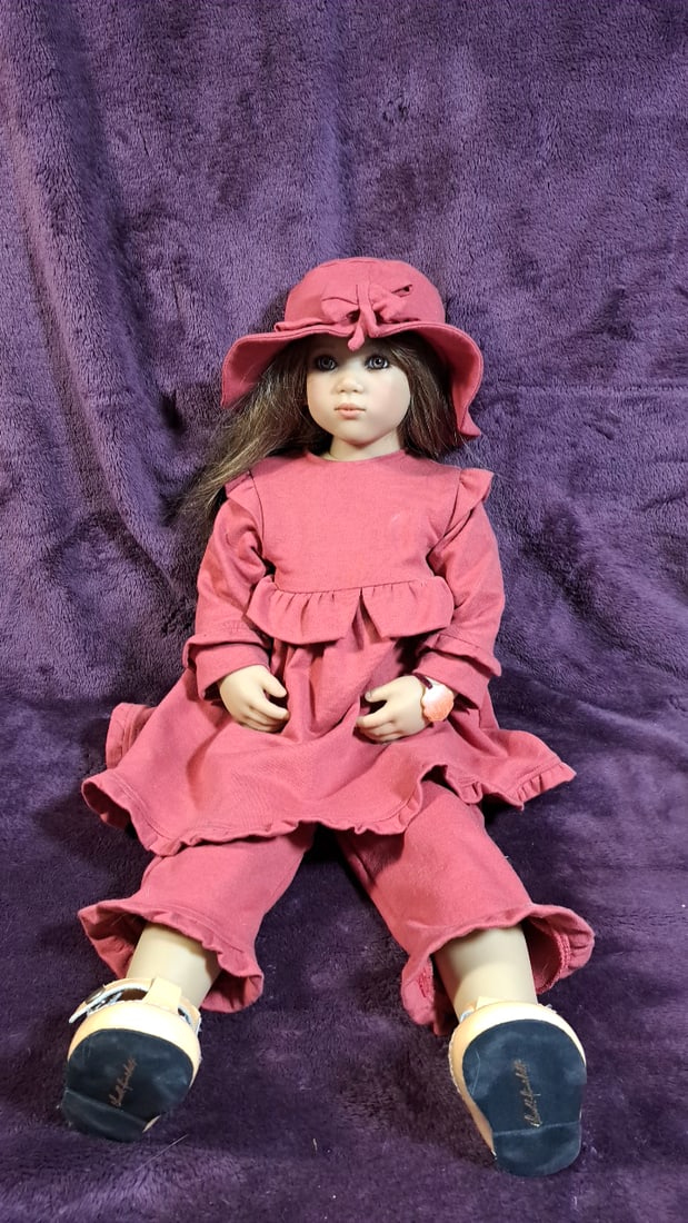 Annette Himstedt Catalina Doll With Coa And Box: Please read descriptions and examine pictures carefully. Take into account shipping when bidding. 40x20x15 15lbs Height: 20 Width: 15 Low Estimate: 50.00 High Estimate: 450.00