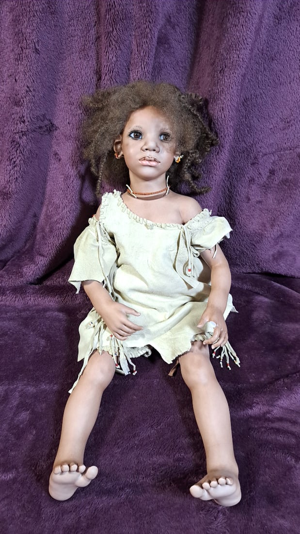 Annette Himstedt Maguki Porcelain Doll With Box: Please read descriptions and examine pictures carefully. Take into account shipping when bidding. Has broken finger 36x20x15 15lbs Height: 20 Width: 15 Low Estimate: 50.00 High Estimate: 350.00
