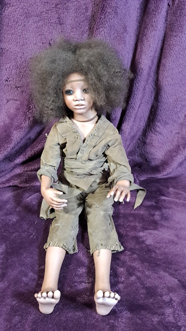 Annette Himstedt Kajali Porcelain Doll With Box: Please read descriptions and examine pictures carefully. Take into account shipping when bidding. 36x20x15 15lbs Height: 20 Width: 15 Low Estimate: 50.00 High Estimate: 500.00