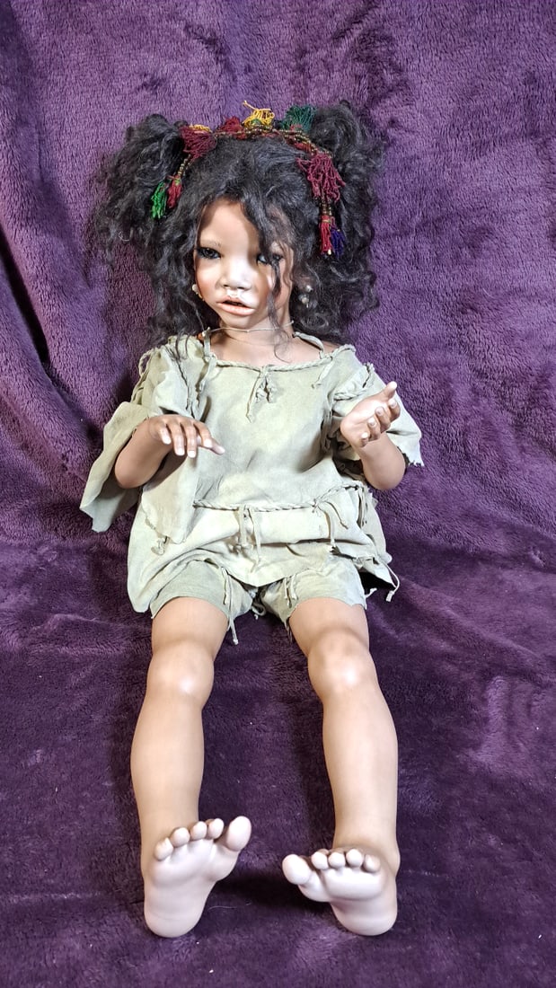Annette Himstedt Lafie Porcelain Doll With Box: Please read descriptions and examine pictures carefully. Take into account shipping when bidding. 40x20x15 15lbs Height: 20 Width: 15 Low Estimate: 50.00 High Estimate: 300.00