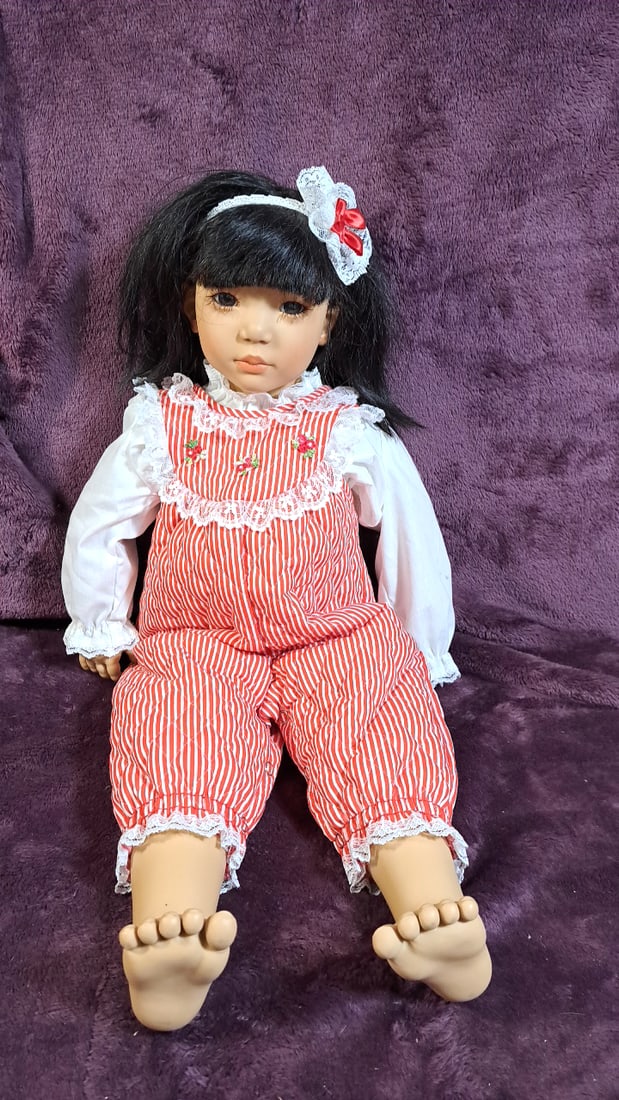Annette Himstedt Shireem Doll With Box: Please read descriptions and examine pictures carefully. Take into account shipping when bidding. Has alternate outfit from box photo 36x20x15 15lbs Height: 20 Width: 15 Low Estimate: 50.00 High Estim