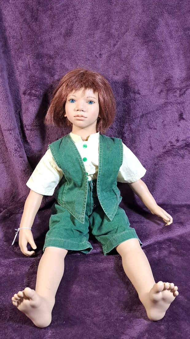 Annette Himstedt Melvin Doll: Please read descriptions and examine pictures carefully. Take into account shipping when bidding. 36x20x15 15lbs Height: 20 Width: 15 Low Estimate: 50.00 High Estimate: 500.00