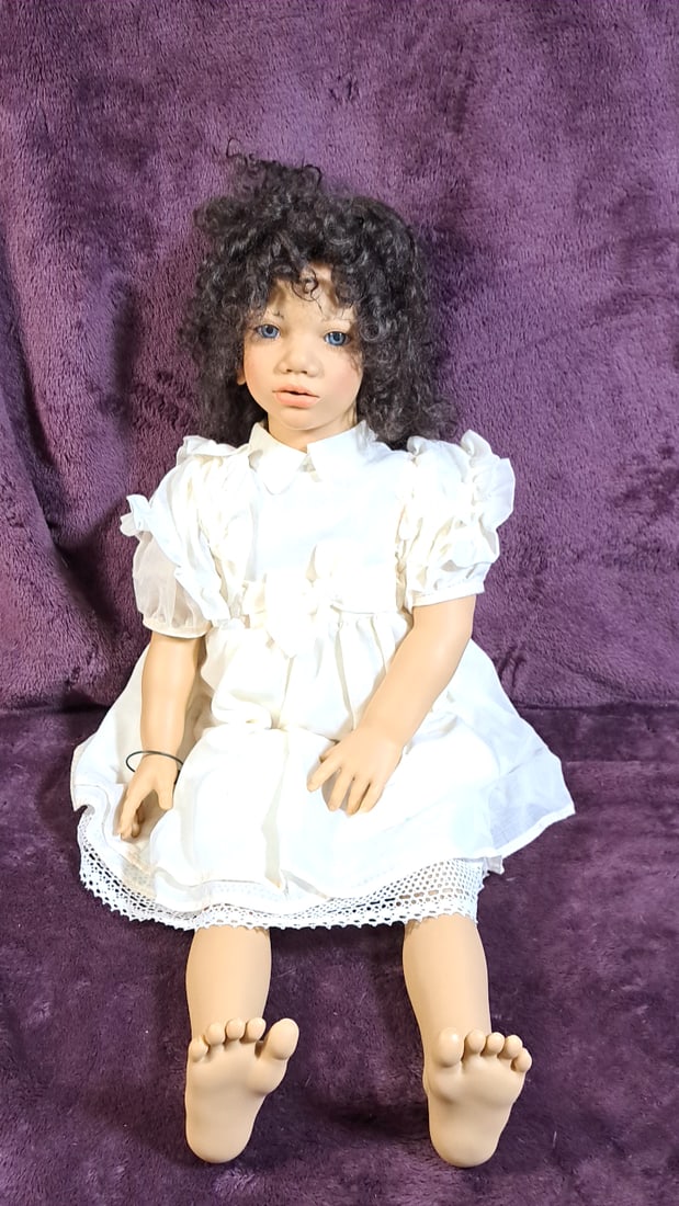 Annette Himstedt Minou Doll With Coa And Box: Please read descriptions and examine pictures carefully. Take into account shipping when bidding. 36x20x15 15lbs Height: 20 Width: 15 Low Estimate: 50.00 High Estimate: 450.00