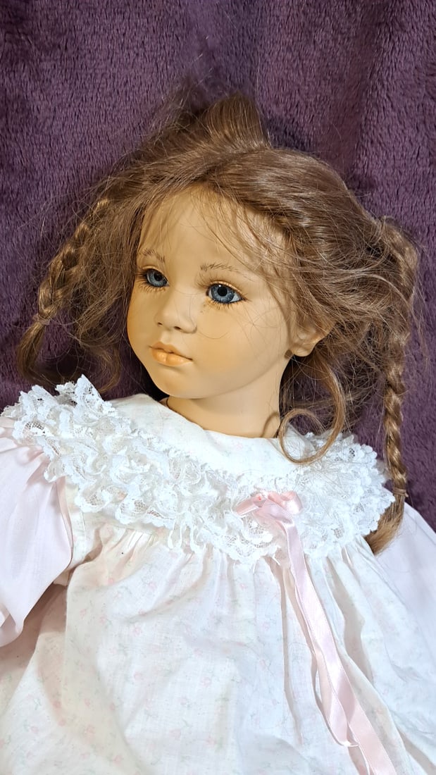 Annette Himstedt Fiene Doll: Please read descriptions and examine pictures carefully. Take into account shipping when bidding. Shoes have some light stains 36x15x15 15lbs Height: 15 Width: 15 Low Estimate: 50.00 High Estimate: 30