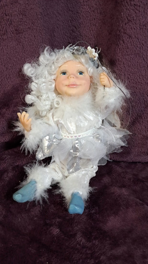 Jkc 9.5" Fairy Doll With Wand: Please read descriptions and examine pictures carefully. Take into account shipping when bidding. 15x10x10 7lbs Height: 10 Width: 10 Low Estimate: 10.00 High Estimate: 25.00