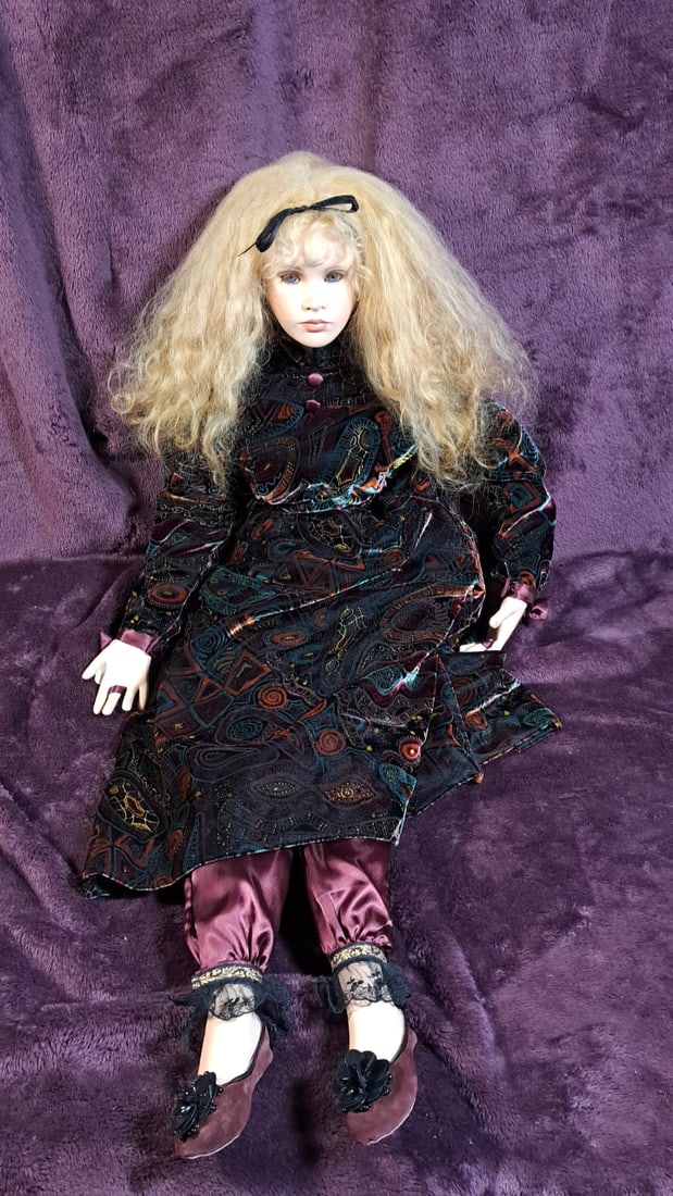 Porcelain Doll 36": Please read descriptions and examine pictures carefully. Take into account shipping when bidding. Arms are disconnected 40x20x10 15lbs Height: 20 Width: 10 Low Estimate: 10.00 High Estimate: 75.00