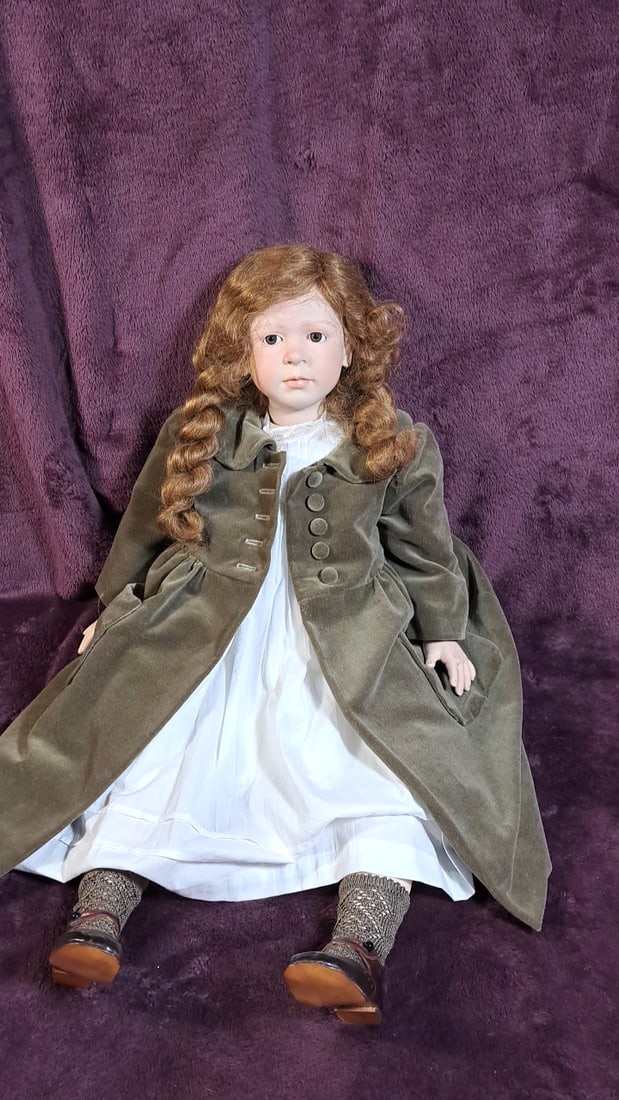 Ruth Mathilde Porcelain Doll 1992 7/75: Please read descriptions and examine pictures carefully. Take into account shipping when bidding. 36x15x20 15lbs Height: 15 Width: 20 Low Estimate: 50.00 High Estimate: 150.00