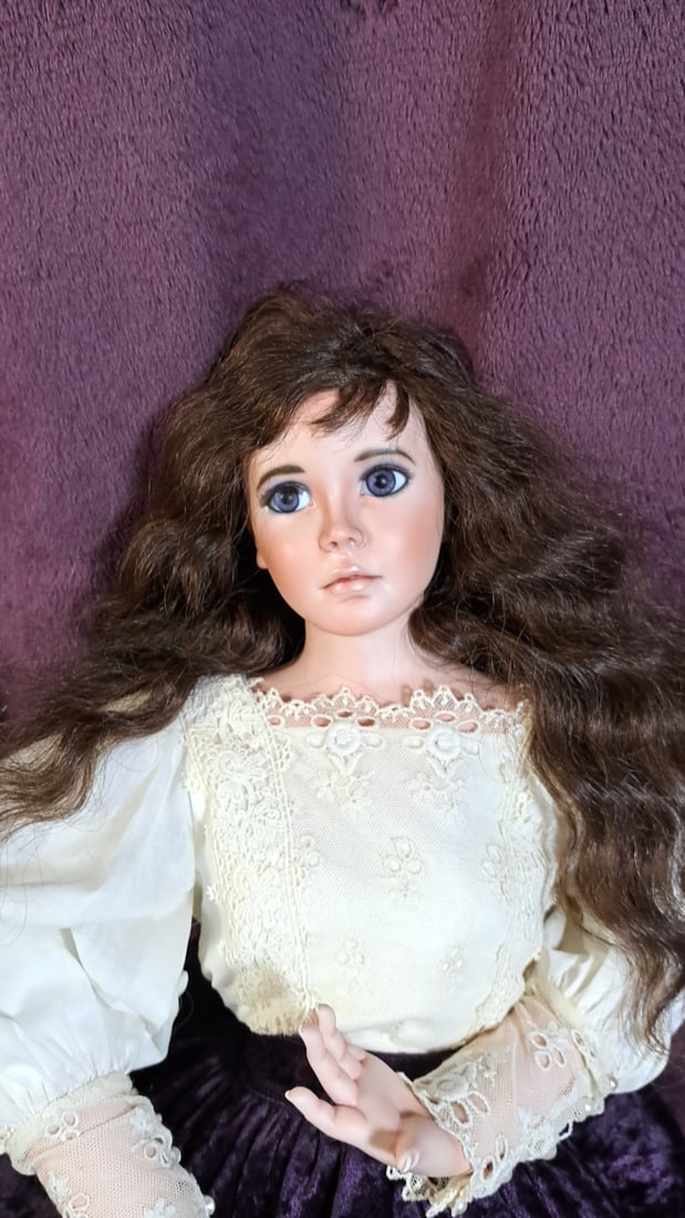 Karen B Aspen Porcelain Doll 1994: Please read descriptions and examine pictures carefully. Take into account shipping when bidding. 36x20x15 15lbs Height: 20 Width: 15 Low Estimate: 50.00 High Estimate: 75.00