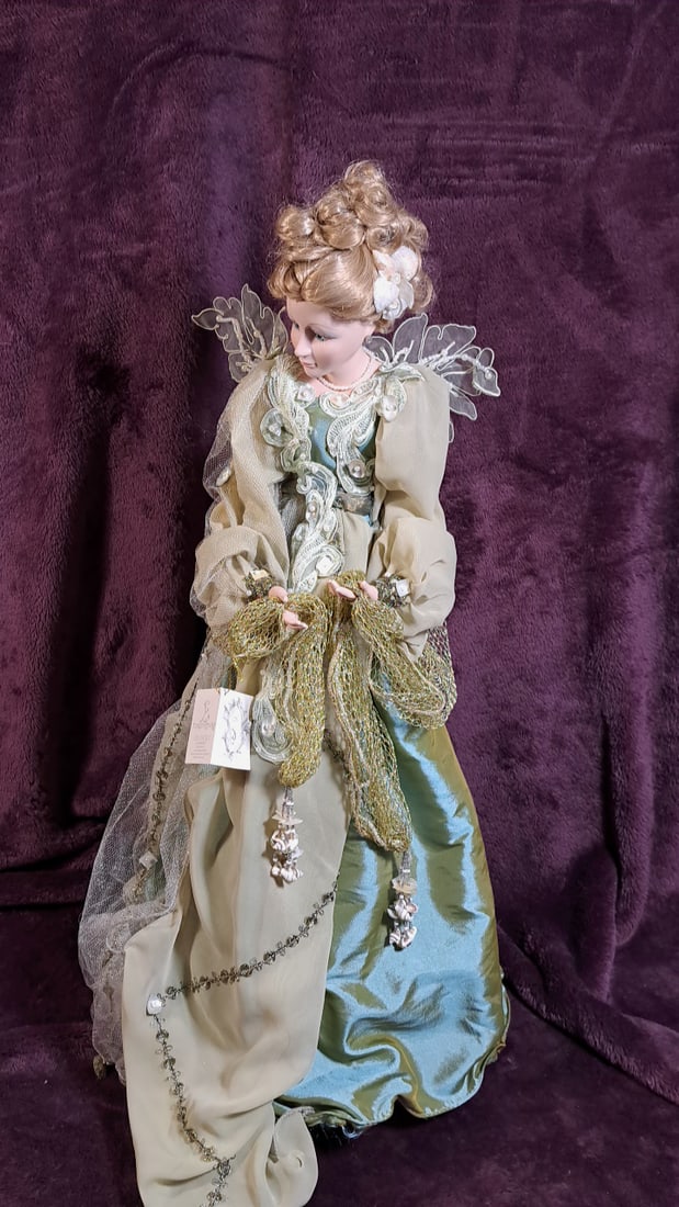 Demeanor Silvestri Porcelain Doll: Please read descriptions and examine pictures carefully. Take into account shipping when bidding. 25x15x15 15lbs Height: 15 Width: 15 Low Estimate: 50.00 High Estimate: 150.00