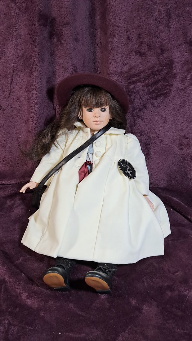 Ruth Treffeisen Porcelain Doll With Hat And Bag: Please read descriptions and examine pictures carefully. Take into account shipping when bidding. 25x15x15 15lbs Height: 15 Width: 15 Low Estimate: 50.00 High Estimate: 200.00