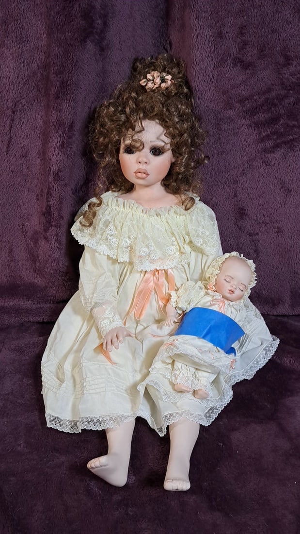 Barbara Grudgeon Victoria Porcelain Doll 1995 With Baby: Please read descriptions and examine pictures carefully. Take into account shipping when bidding. 30x15x15 15lbs Height: 15 Width: 15 Low Estimate: 50.00 High Estimate: 150.00