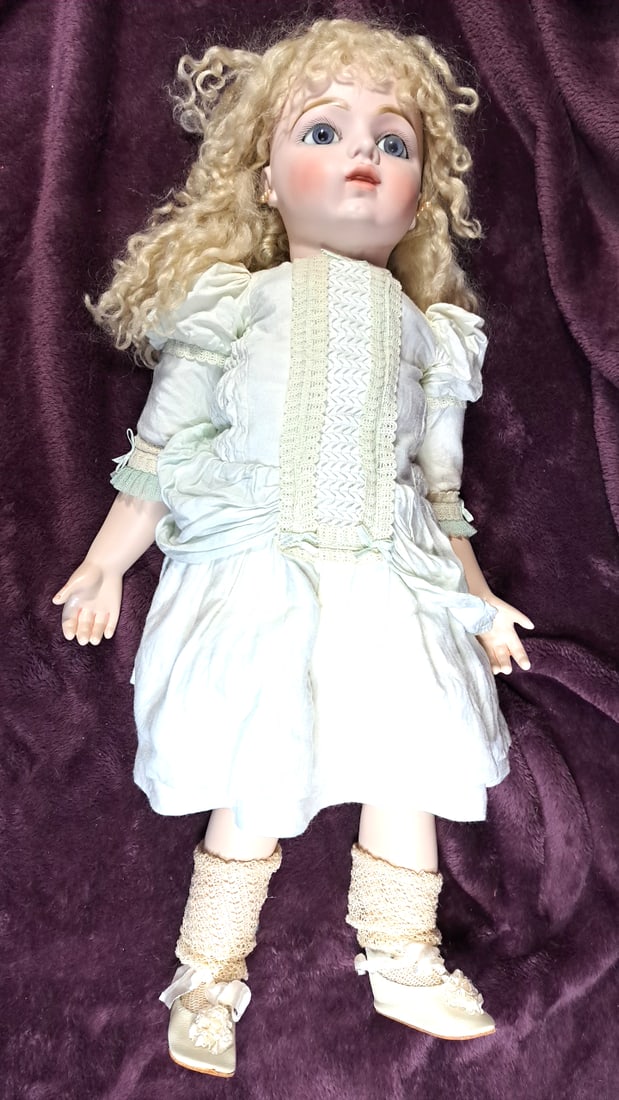 Colleen Phillips Porcelain Doll With Blonde Curls In White Dress And Lace Accents: Please read descriptions and examine pictures carefully. Take into account shipping when bidding. 27x10x10 5lbs Height: 10 Width: 10 Low Estimate: 15.00 High Estimate: 150.00