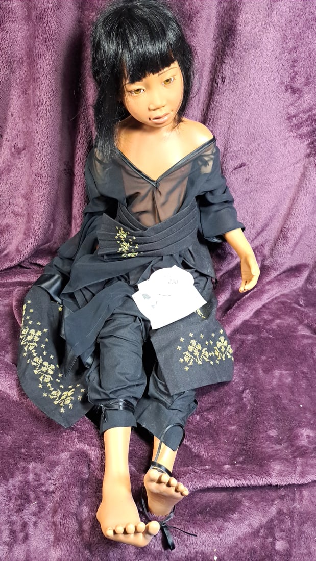 Gotz Philip Heath Jerteh Doll 1995 In Black Outfit With Yellow Embroidery, Black Hair: Please read descriptions and examine pictures carefully. Take into account shipping when bidding. 40x10x10 5lbs Height: 10 Width: 10 Low Estimate: 30.00 High Estimate: 150.00