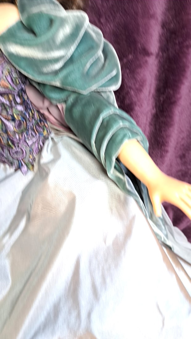 Wax Over Porcelain Art Doll With Teal Velvet Sleeves, Silver Gown Floral Headpiece - 4