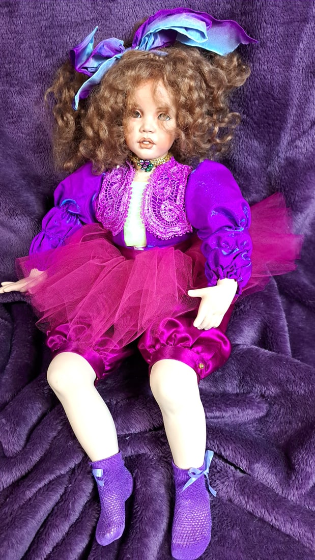 Patricia Rose 1993 Brandy Signed Limited Edition Porcelain Doll #19/25 Purple Outfit: Please read descriptions and examine pictures carefully. Take into account shipping when bidding. 20x10x10 5lbs Height: 10 Width: 10 Low Estimate: 25.00 High Estimate: 400.00