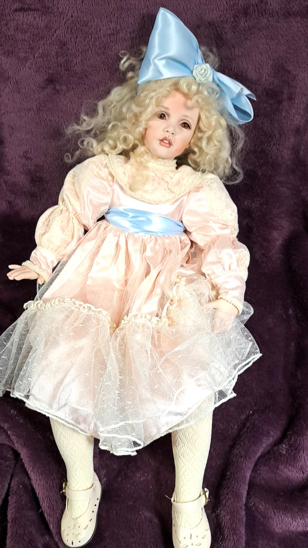 Patricia Rose "laura" Porcelain Doll #2/25 Le Pink Dress Blue Bow: Please read descriptions and examine pictures carefully. Take into account shipping when bidding. 24x10x10 4lbs Height: 10 Width: 10 Low Estimate: 20.00 High Estimate: 700.00