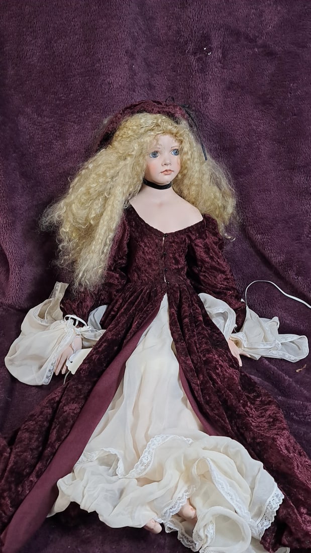 Porcelain Doll With Hat: Please read descriptions and examine pictures carefully. Take into account shipping when bidding. 35x20x15 15lbs Height: 20 Width: 15 Low Estimate: 50.00 High Estimate: 35.00
