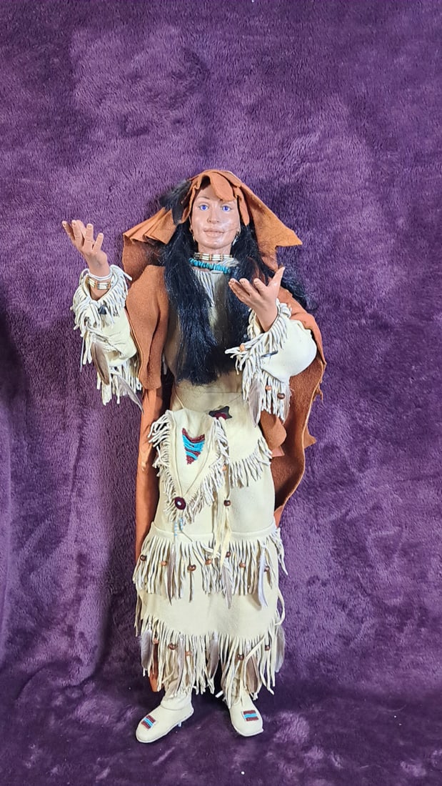 Sth Limited Edition Native American Doll: Please read descriptions and examine pictures carefully. Take into account shipping when bidding. Has cracked finger 30x15x15 15lbs Height: 15 Width: 15 Low Estimate: 50.00 High Estimate: 150.00