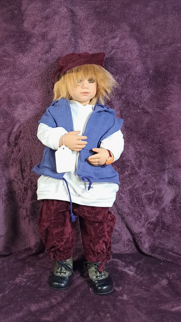 Annette Himstedt Oscar Doll With Coa: Please read descriptions and examine pictures carefully. Take into account shipping when bidding. 35x20x15 15lbs Height: 20 Width: 15 Low Estimate: 50.00 High Estimate: 650.00