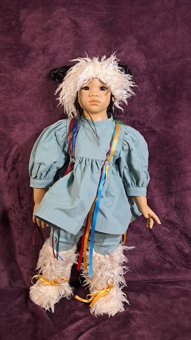 Annette Himstedt Kima Doll With Box: Please read descriptions and examine pictures carefully. Take into account shipping when bidding. 40x20x15 15lbs Height: 20 Width: 15 Low Estimate: 50.00 High Estimate: 400.00