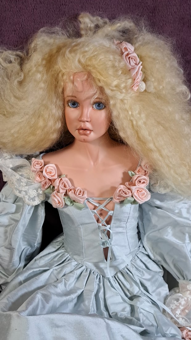 Real Hair Savannah Joyce Nicholson Artist Signed Porcelain Doll: Please read descriptions and examine pictures carefully. Take into account shipping when bidding. 40x20x15 15lbs Height: 20 Width: 15 Low Estimate: 50.00 High Estimate: 150.00