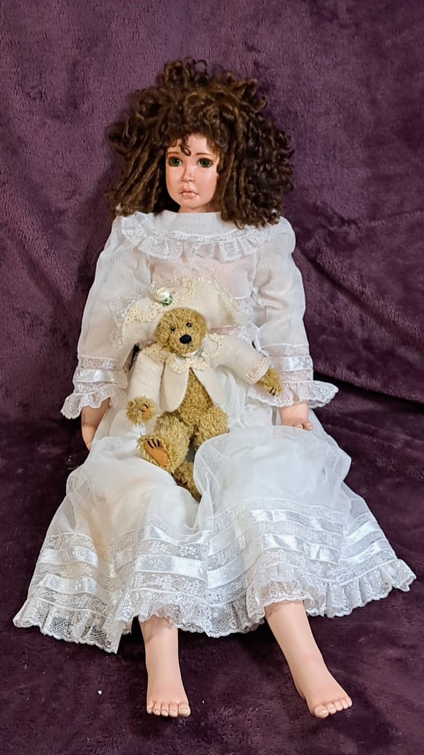 Krey Baby Waverly Porcelain Doll By Kathy A. With Teddy Bear: Please read descriptions and examine pictures carefully. Take into account shipping when bidding. 35x20x15 15lbs Height: 20 Width: 15 Low Estimate: 50.00 High Estimate: 150.00