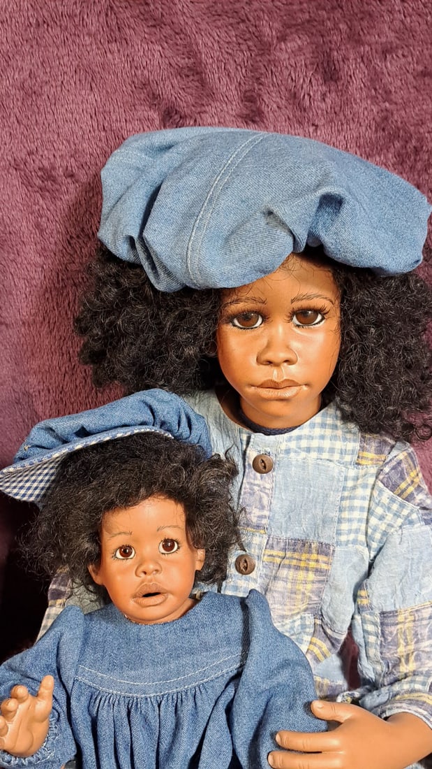 Reucite Hoke Porcelain Doll With Baby: Please read descriptions and examine pictures carefully. Take into account shipping when bidding. Babys toes are broken 25x15x10 15lbs Height: 15 Width: 10 Low Estimate: 50.00 High Estimate: 150.00