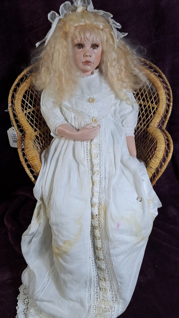 C Cumming Porcelain Doll with Blonde Hair, White Lace Dress, Bonnet and Wicker Chair (1 of 12)