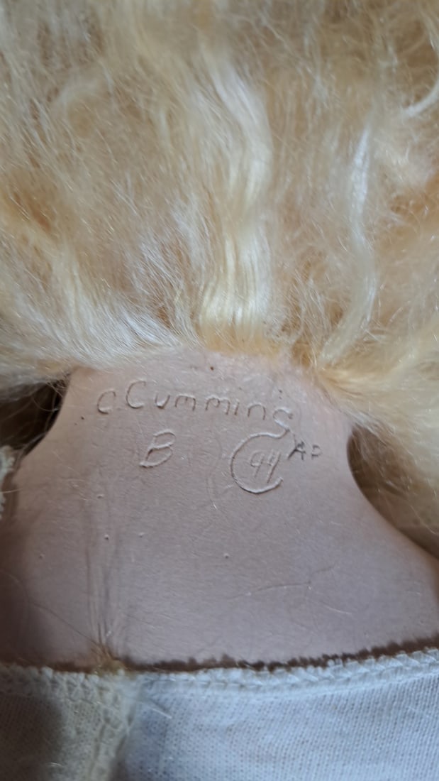 C Cumming Porcelain Doll with Blonde Hair, White Lace Dress, Bonnet and Wicker Chair - 5