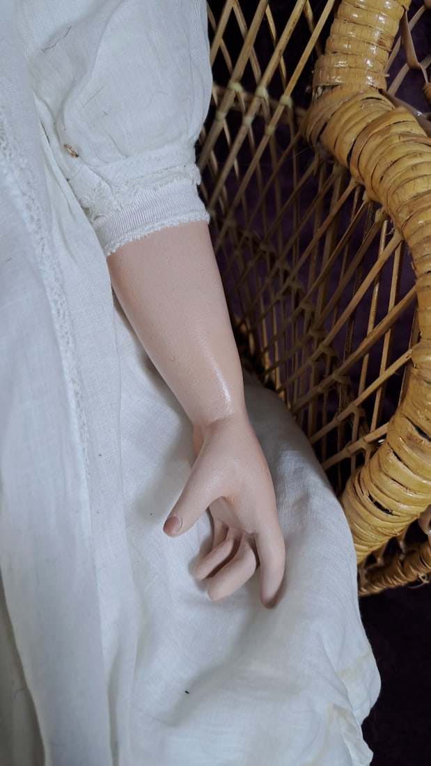 C Cumming Porcelain Doll with Blonde Hair, White Lace Dress, Bonnet and Wicker Chair - 6